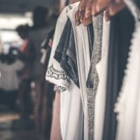 clothes hanging in a boutique - top 6 technology impacts on fashion trends